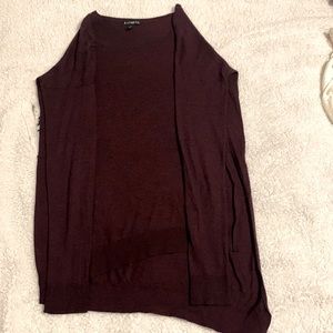A small burgundy sweater